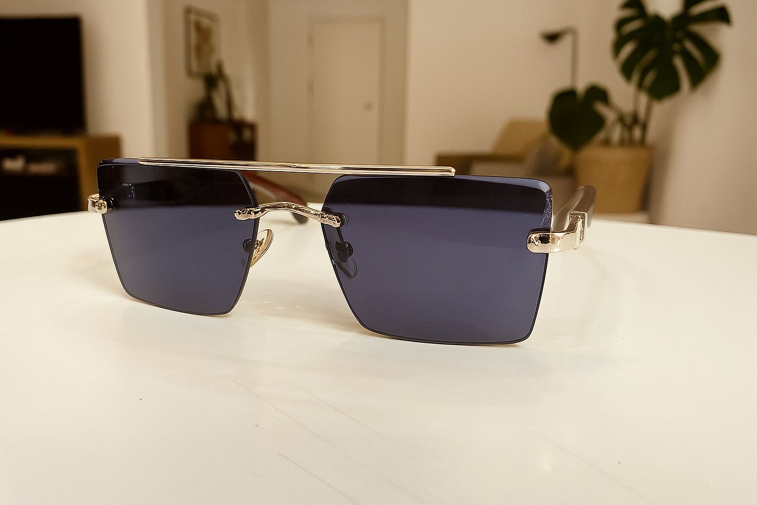  Meeran panther  sunglasses with blue lenses and a black/silver frame, featuring UV protection